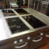 Modular centre island induction hob-cooker suite with 6 station hot cupboard